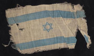 The Flag of Israel Raised by Holocaust Survivor Eleazar Shafrir