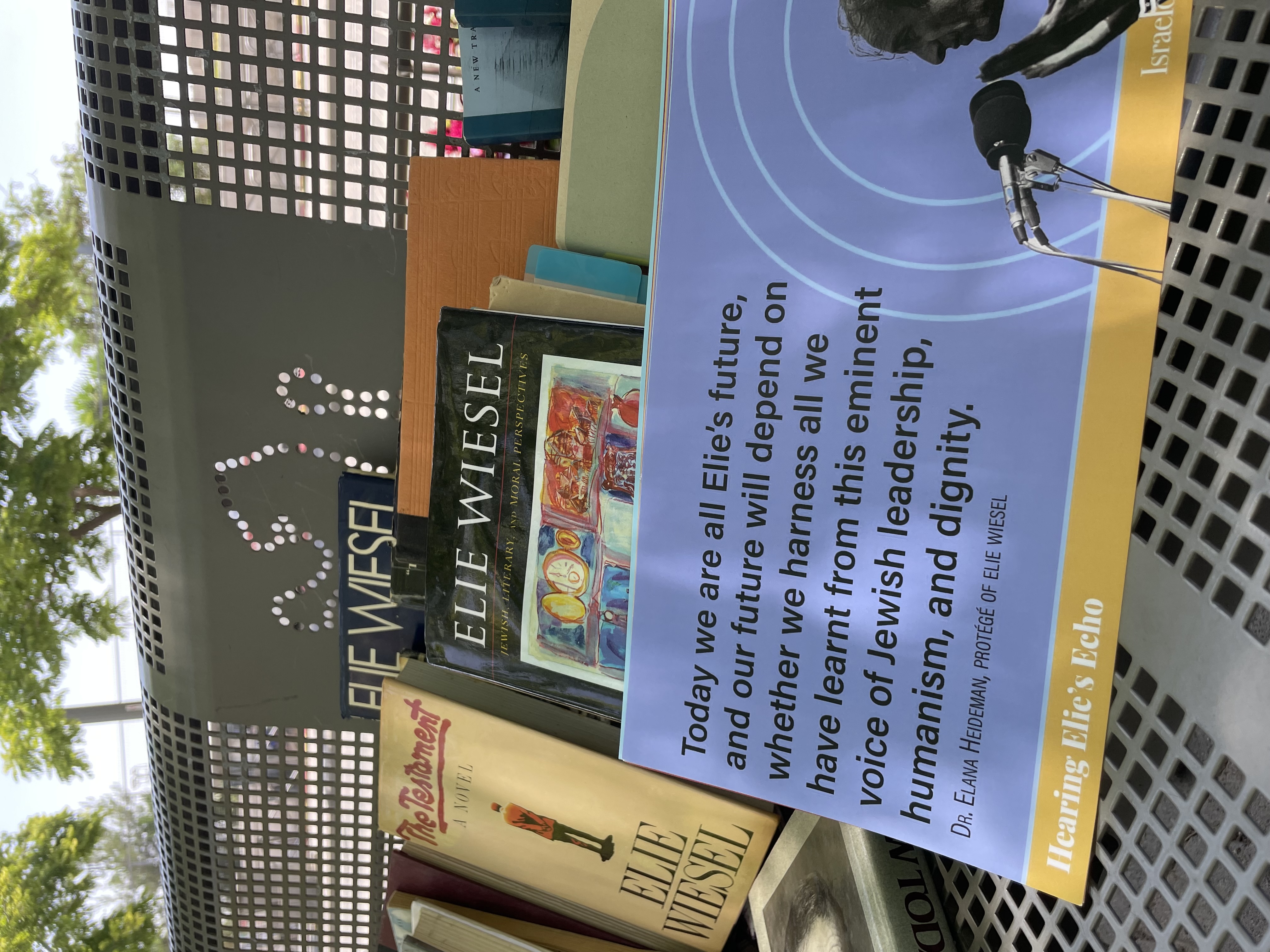 Books and quotes on bench