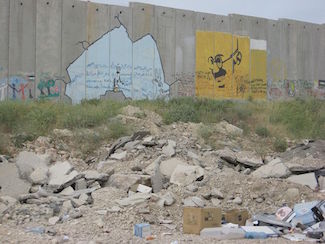 Gandhi Graffiti on apartheid wall Szater