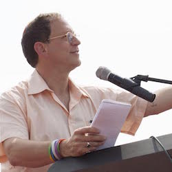 Headshot of Yosef Abramowitz, environmentalist and solar power developer
