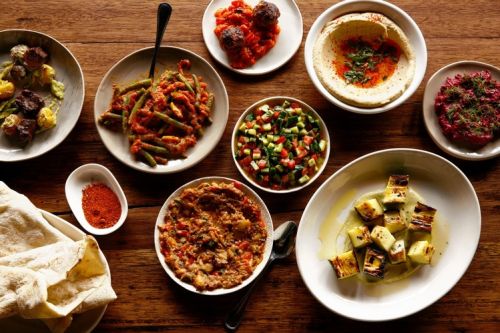 A spread of dishes by Chef Michael Solomonov. 